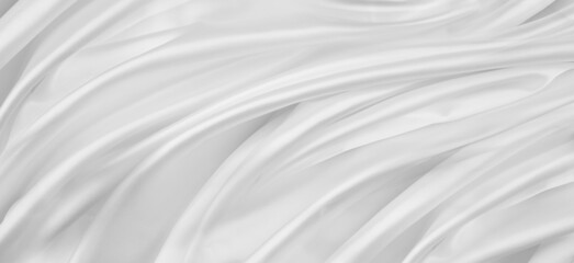 Obraz na płótnie Canvas Close-up of rippled white silk fabric lines