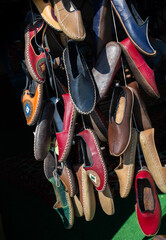 Set of traditional hand made leather shoes in bazaar