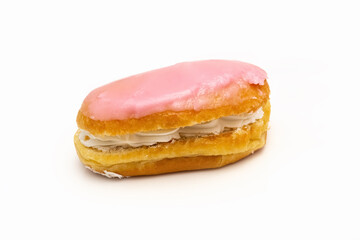 Glazed buns with cream on a plate on a white background. IsolatePhoto