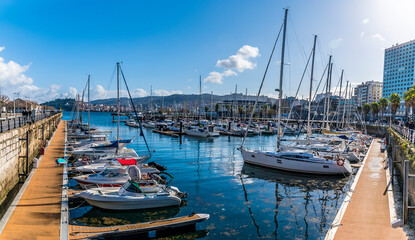 Fototapeta na wymiar A panorama view across the marina in Vigo, Spain on a spring day