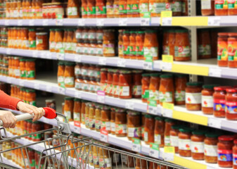 choosing a dairy products at supermarket