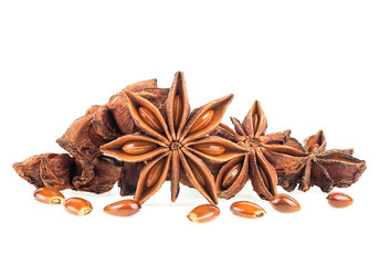 Dry anise stars with seeds isolated on a white background, front view. Star anise spice fruits.