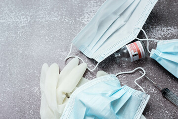 Medical waste from vaccinations, medical gloves, syringes, masks.