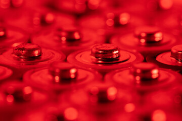 Closeup of positive ends of discharged batteries AA sizes, macro shot, selective focus. Used...