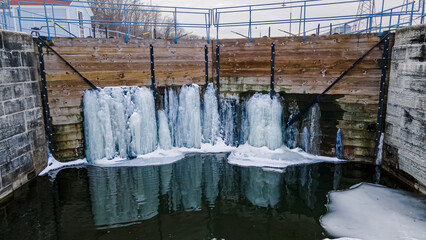 Old canal with leaks in winter
