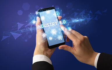 Hand using smartphone with technology concept