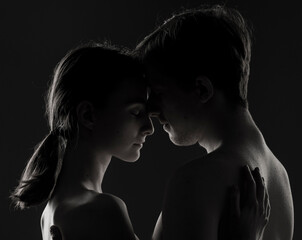 Fototapeta premium tender hugs and feelings of young guys and girls in love