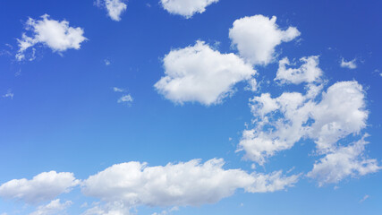 Cumulus clouds and blue sky suitable for background or sky replacement.