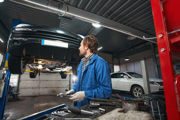 Portrait of mechanic working at service station