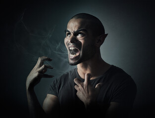 Unleashing the beast within. Computer manipulated shot of a man turning into a monster.