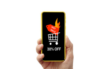 Hand holding a smartphone that on its screen announces a 30 percent discount for the hot sale.