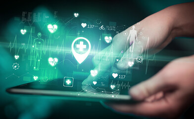 Close-up of a touchscreen with healthcare icons