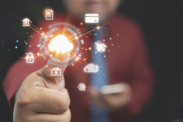 Businessman showing thumb rise up touching virtual screens at icon cloud computing. Technology for download upload data information internet online networking. Technology transformation concept.