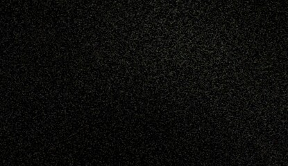 Black sanded texture abstract material background. Dark grains close up surface.