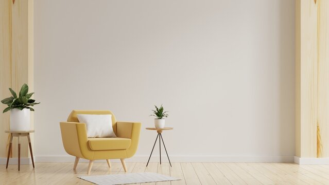 Modern minimalist interior with an yellow armchair on empty white wall background.