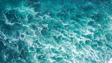 Waves of water of the river and the sea meet each other during high tide and low tide. Whirlpools of the maelstrom - obrazy, fototapety, plakaty