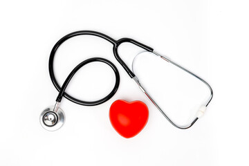 Stethoscope near rubber heart  health care concept on white background top view space for text