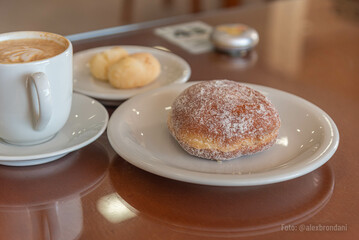 Confectionery dessert accompanied by a cup of coffee