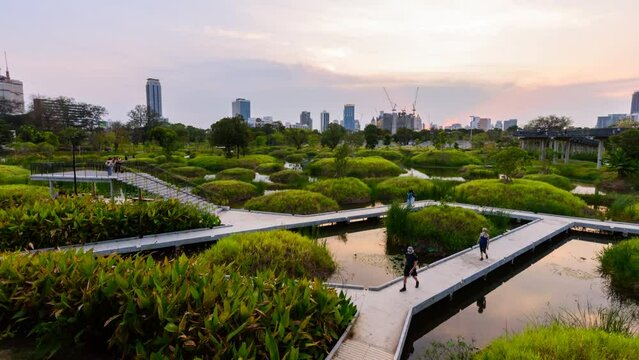 view of Benchakitti Park in evening time
