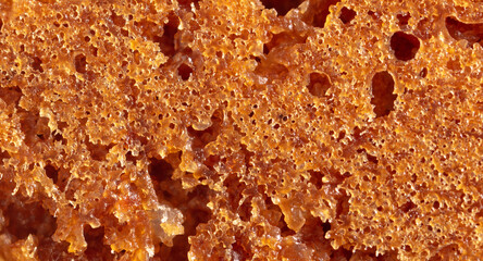 Fototapeta premium Crust on ruddy cookies as an abstract background.