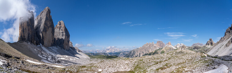 Amazing view of the wonderful 3 Cime di Lavaredo from the hiking trail. Dolomites in Italy. Wonderful nature contest. Alpine landscape. Western Alps. summer time