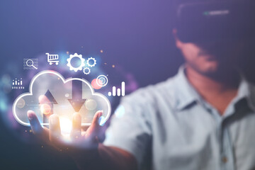 Concept metaverses. Man wears VR glasses and accesses Cloud Technology Internet Network data systems and databases through technology.
