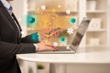 Doctor working on laptop with healthcare concept