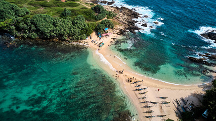 Aerial view of blue beach island. Drone view of the beaches of Sri Lanka