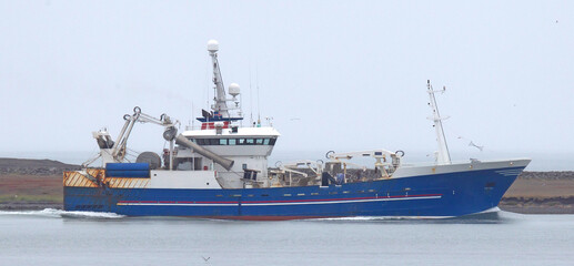Fototapeta premium Commercial pelagic fishing vessel fishing in Icelandic waters