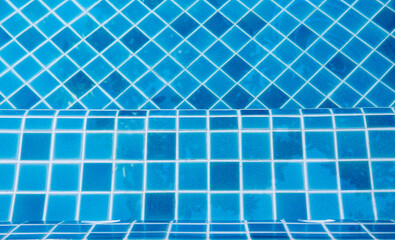 Blue swimming pool tile pattern, pool tile design, beautiful blue tile under clear water