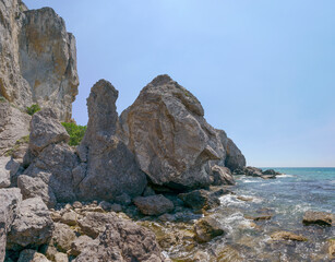 Fototapeta na wymiar Rocks at the bottom of Alchak mountain in Sudak, Crimea.