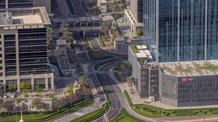 Bussy traffic on the intersection in Dubai downtown aerial timelapse.