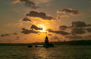 Maidens Tower at sunset, İstanbul. Beautiful clouds with blue sky. Historical light house of...