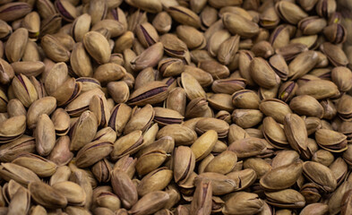 Pistachios texture and background . Tasty pistachios as background,as pistachios texture. flat lay