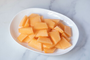 Fresh Japanese melon with orange pulp
