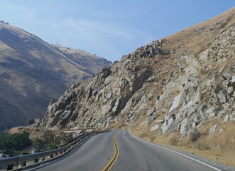 Dangerous twists and turns at Kern Canyon Road or Callifornia Highway Route 178, with rocks on the cliffsides.