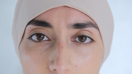 Close-up of the eyes of a beautiful Muslim woman, which gaze intently into the depths of your soul....