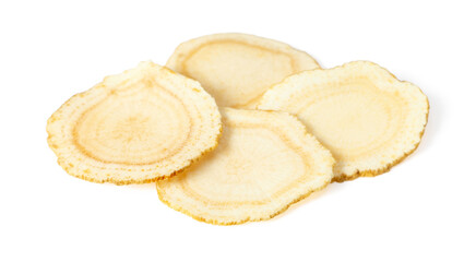Close up of ginseng slices isolated on white background.