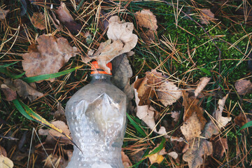 Obraz premium Pollution concept, plastic bottle waste top view