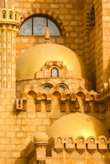 Photo portrait focused architecture culture landmark religion Islamic Ramadan lantern of red and yellow mosque at Sharm El-Sheikh in Egypt