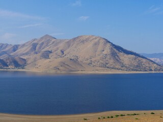 Medium wide shot of Lake Isabella, located in the southern Sierra Nevada, in Kern County, California