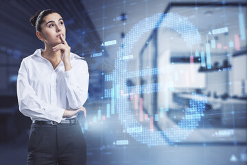 Attractive thoughtful european businesswoman with abstract glowing growing forex chart and euro currency sign standing on blurry office interior background. Trade, finance and economy concept. 
