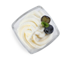 Delicious fresh whipped cream with blueberries and mint isolated on white, top view