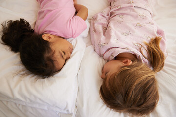 Obraz na płótnie Canvas I LOVE sleepovers. Shot of cute little girls having a sleepover.