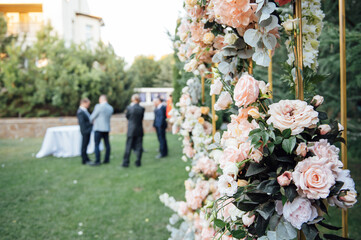 Square arch for a wedding ceremony. beautiful flowers