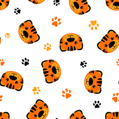 Seamless pattern of a cute tigers and animal's paws. Vector illustration on a white background.