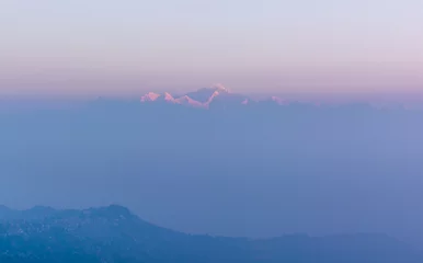Photo sur Plexiglas Kangchenjunga Lever du soleil sur la chaîne de montagnes Kangchenjunga. Kangchenjunga est la troisième plus haute montagne du monde.