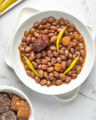 Beans recipe with chillies, black pudding and chorizo