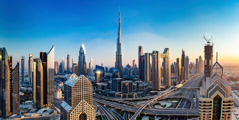Burj Khalifa in Dubai downtown skyscrapers highrise architecture at sunset
