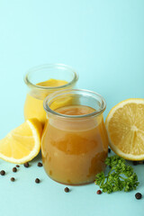 Concept of tasty food with sauce on blue background